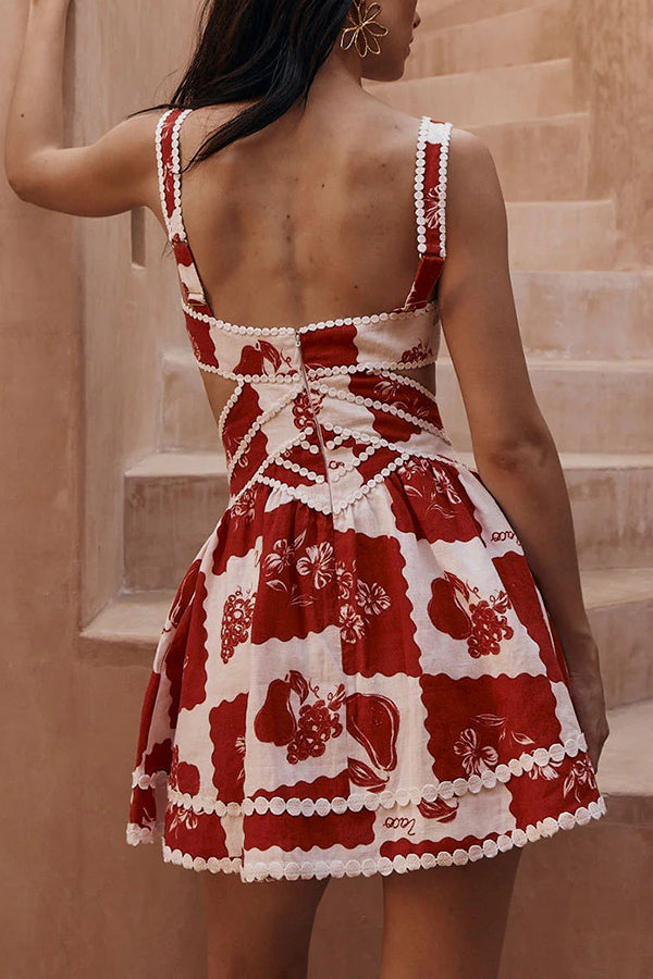 Women red and white printed mini dress with back zipper and criss-cross details