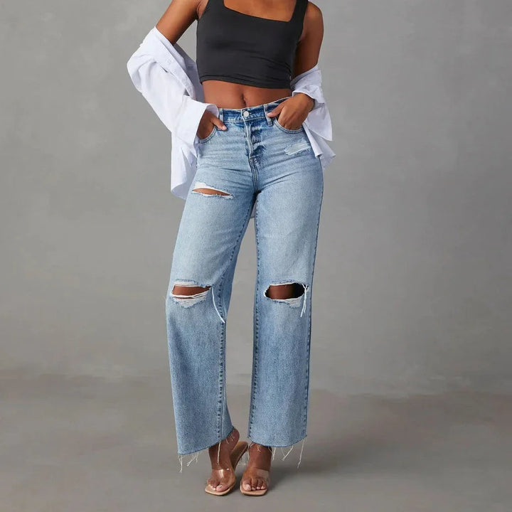 Women light blue ripped straight leg jeans with high waist and frayed hem, front view