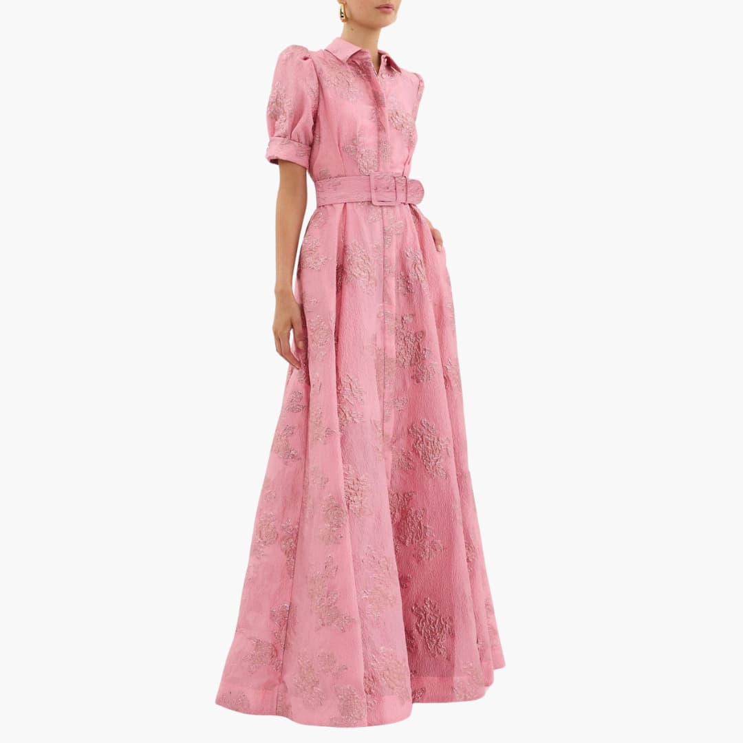 Women pink floral maxi dress with belted waist and puff sleeves, side view