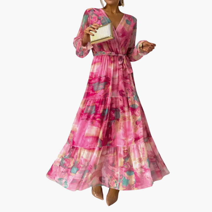 Women's pink floral V-neck maxi dress with long sleeves and tie waist, front view