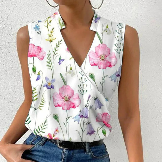 Women white floral V-neck sleeveless blouse with pink and purple flowers, front view