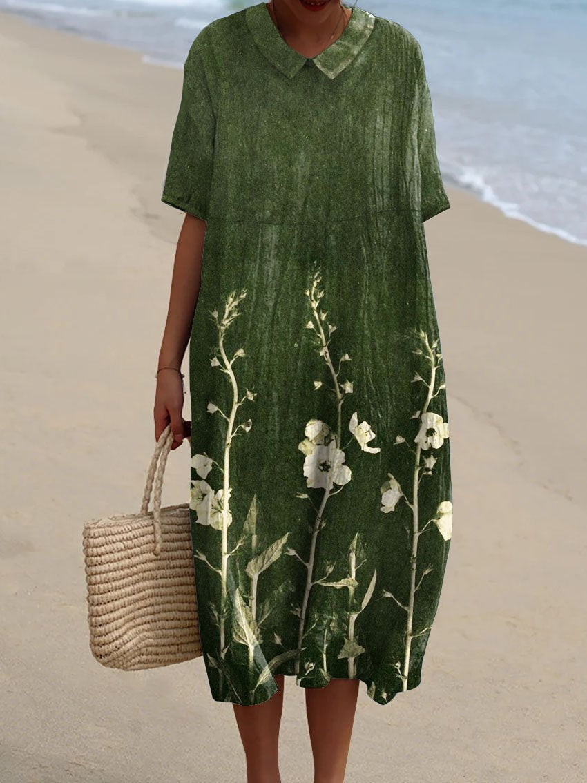 Women green collared floral printed midi dress with short sleeves, front view