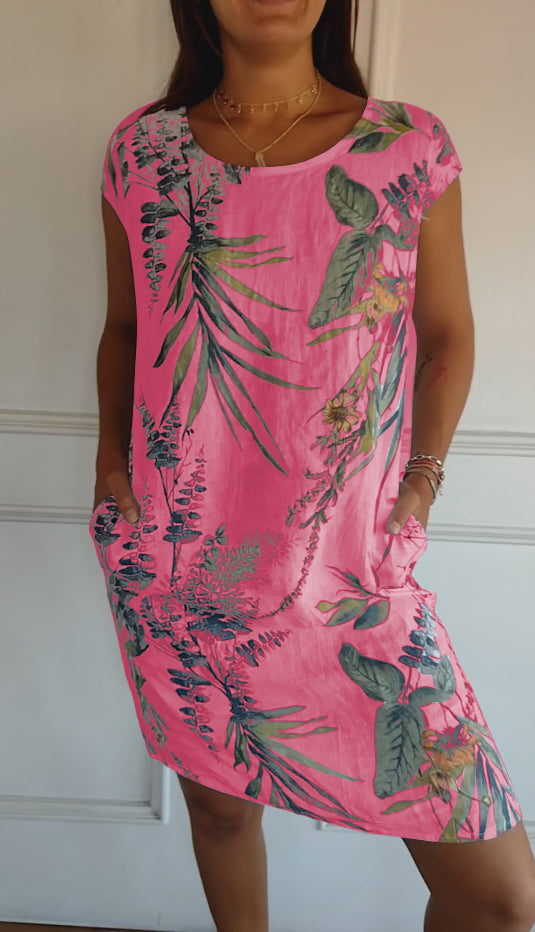 Women's pink green leaf print midi dress with short sleeves and scoop neck, front view