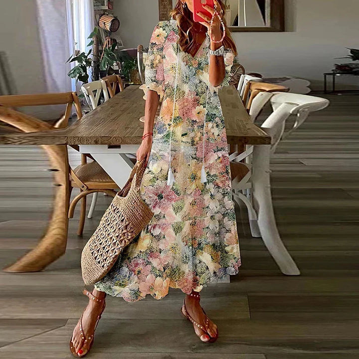 Women's multi-color floral print maxi dress with V-neckline and short sleeves, front view