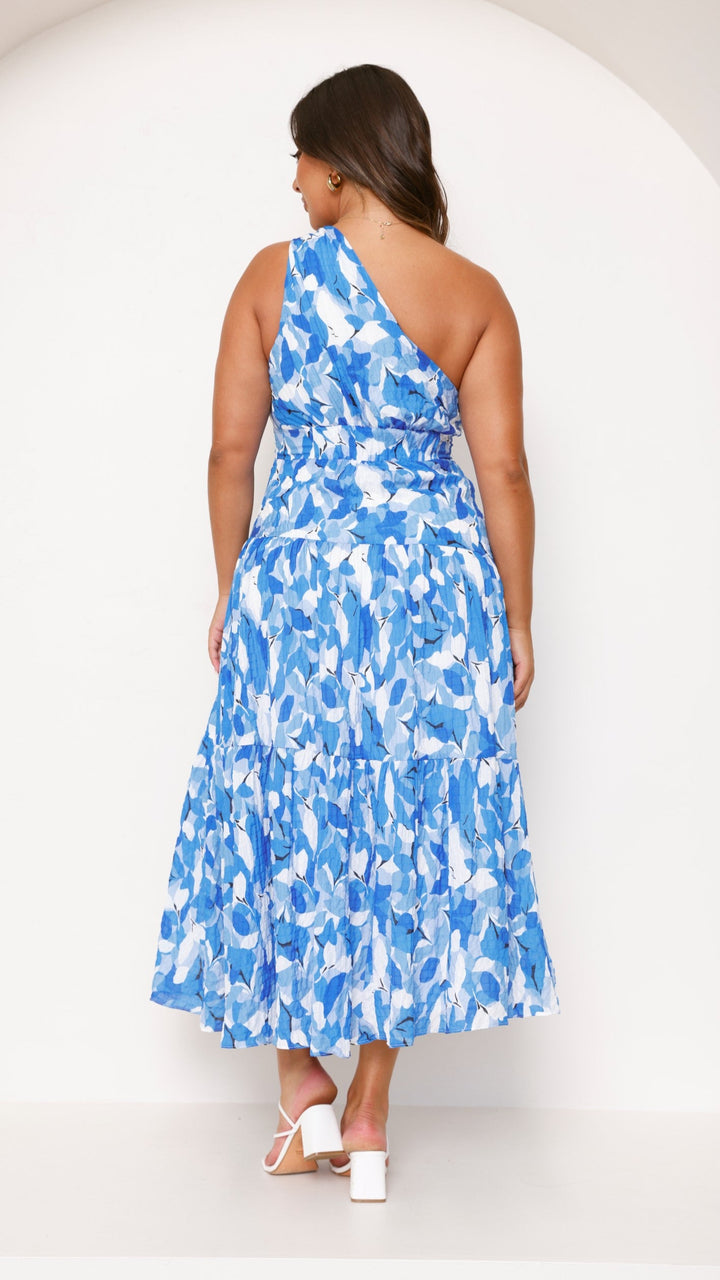 Women blue floral print midi dress, back view, one-shoulder and shirred back detail
