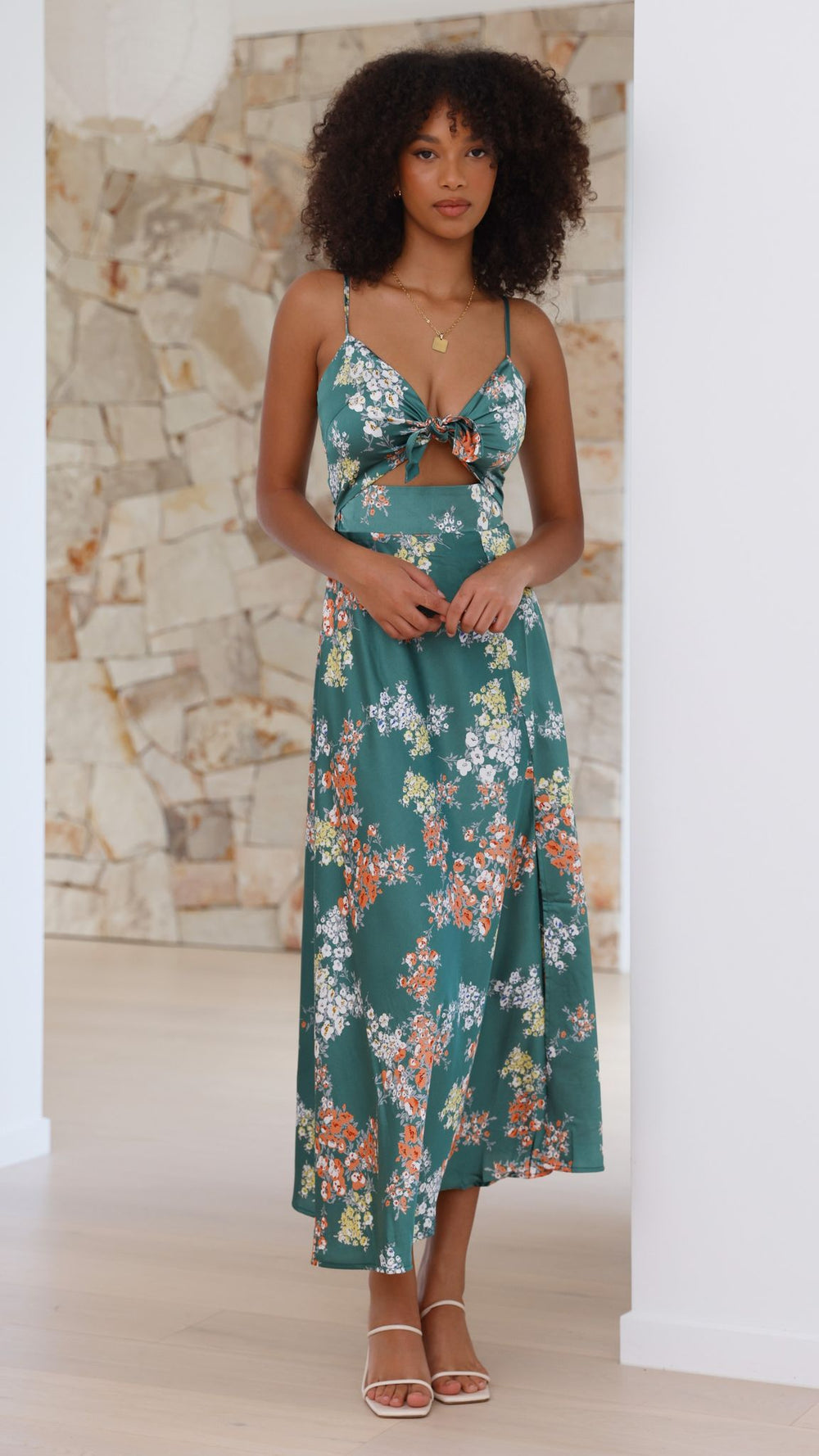 Women green multi floral midi dress with tie-up bust and waist cut-out