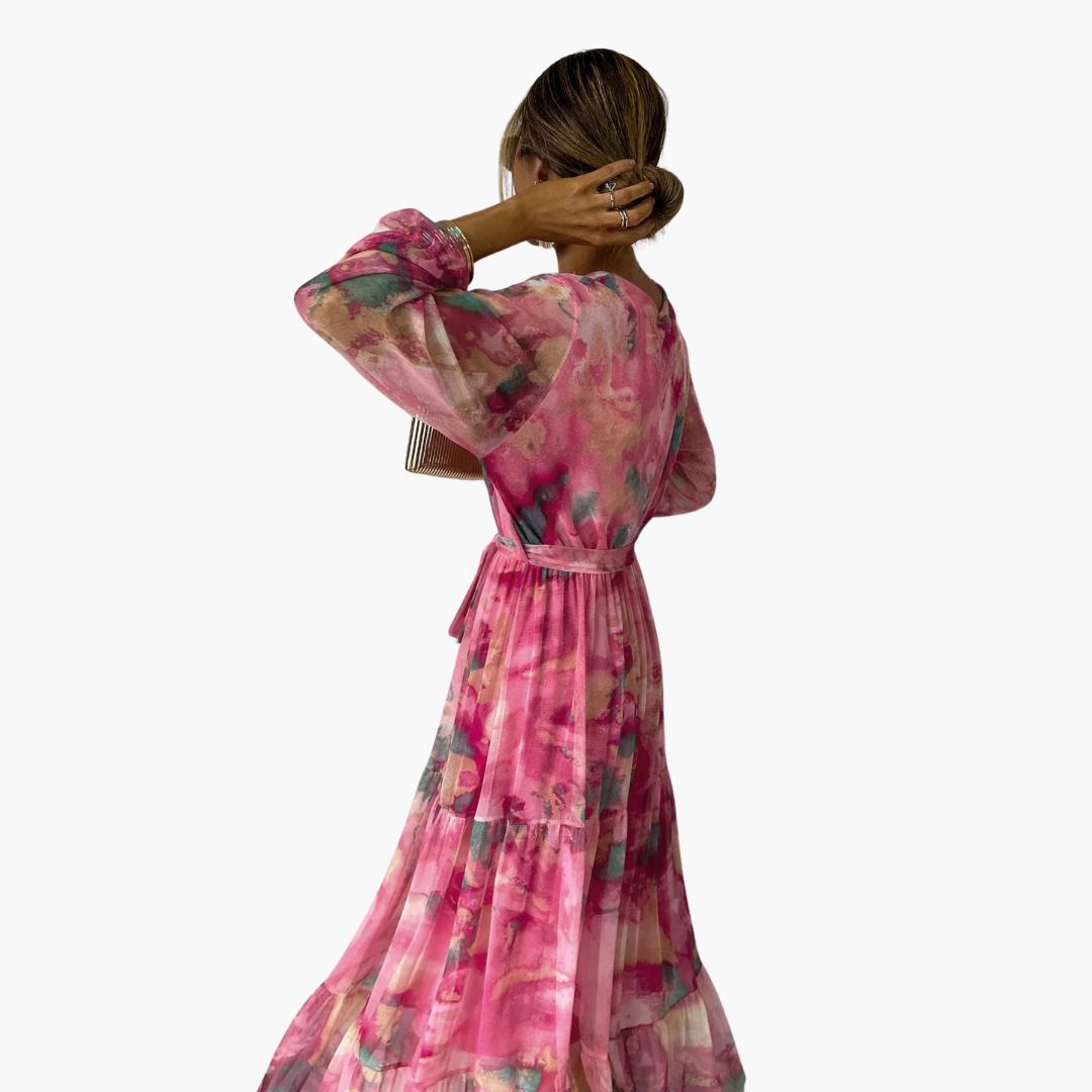 Women's pink floral V-neck maxi dress, back view showing long sleeves
