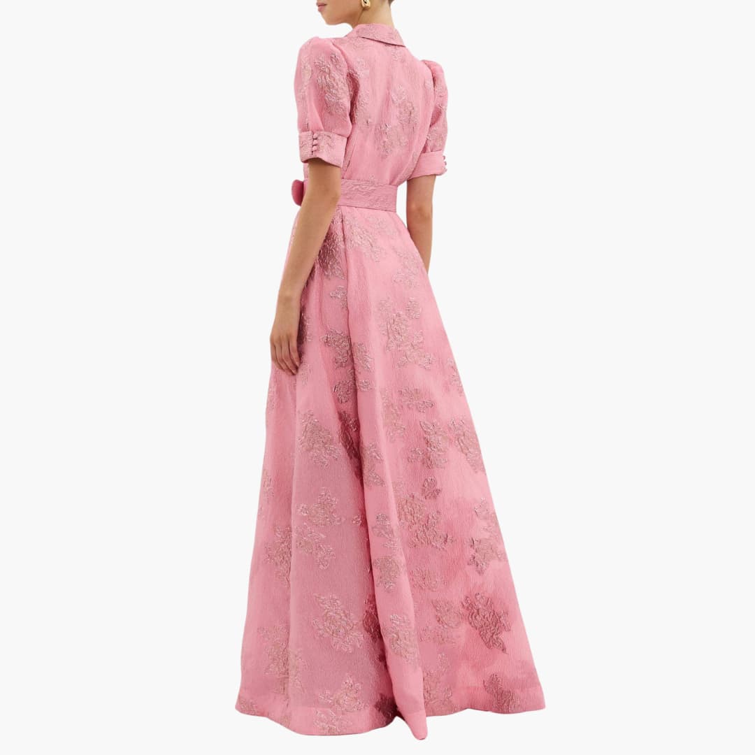 Women pink floral maxi dress with embossed pattern and belted back, rear view