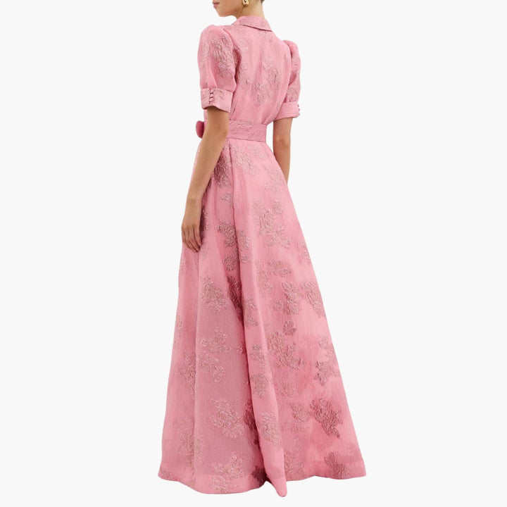 Women pink floral maxi dress with embossed pattern and belted back, rear view