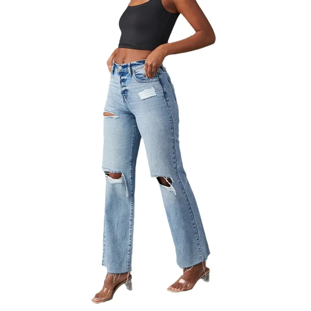 Women light blue ripped straight leg jeans with high waist, button fly, and frayed hem, full length