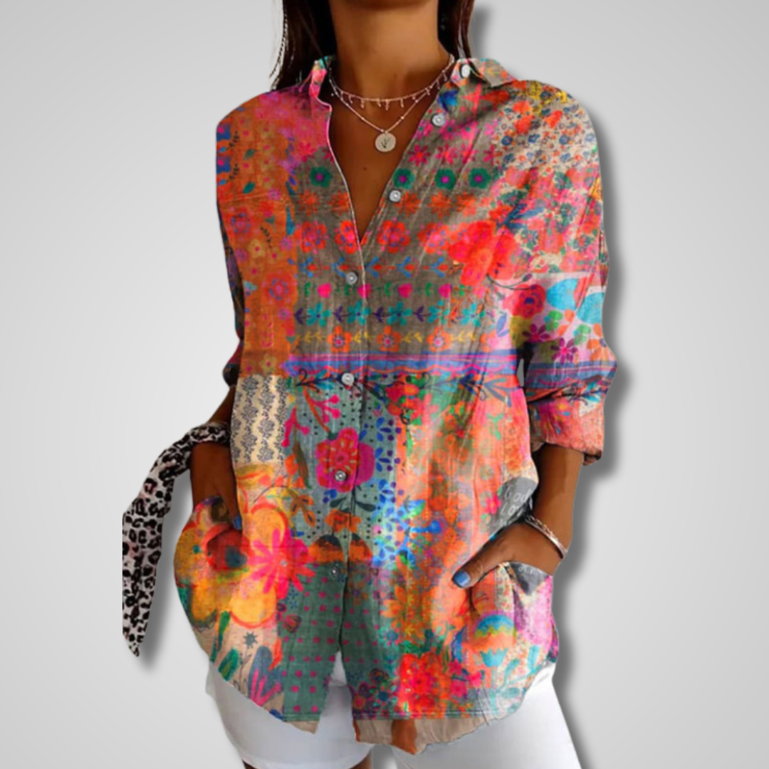 Women's multicolor floral patchwork printed button-down long sleeve shirt, front view on model