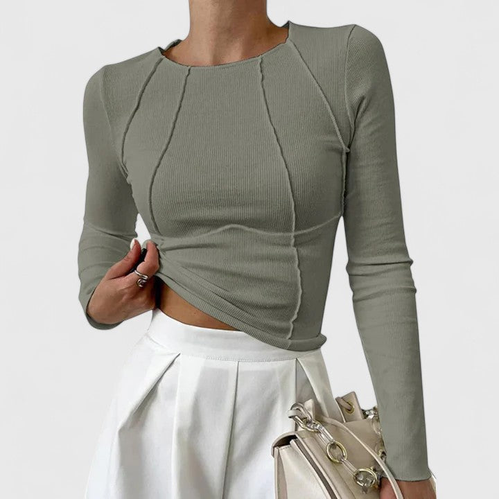 Women grey ribbed knit long sleeve top with exposed seam detailing, front view