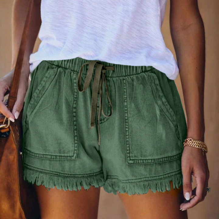 Women olive green casual shorts with an elasticated drawstring waist and distressed frayed hem.