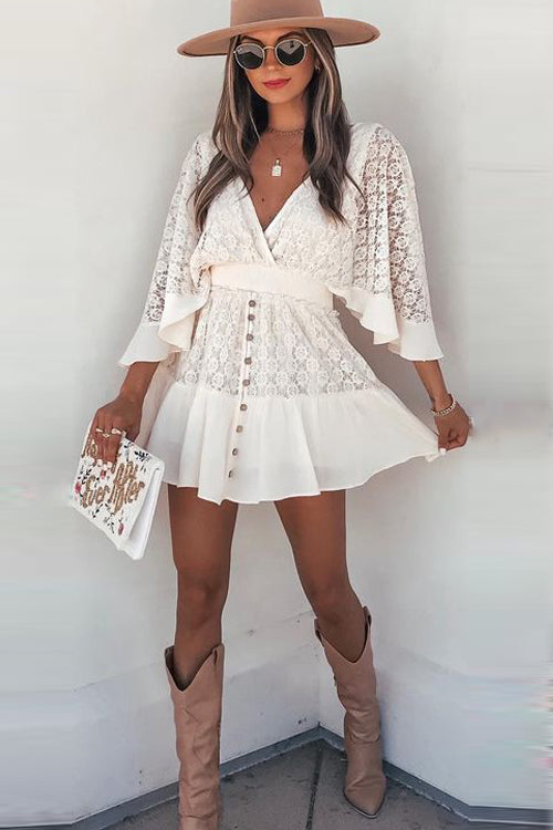 Women's white lace mini dress with V-neck, ruffled sleeves, and visible button details