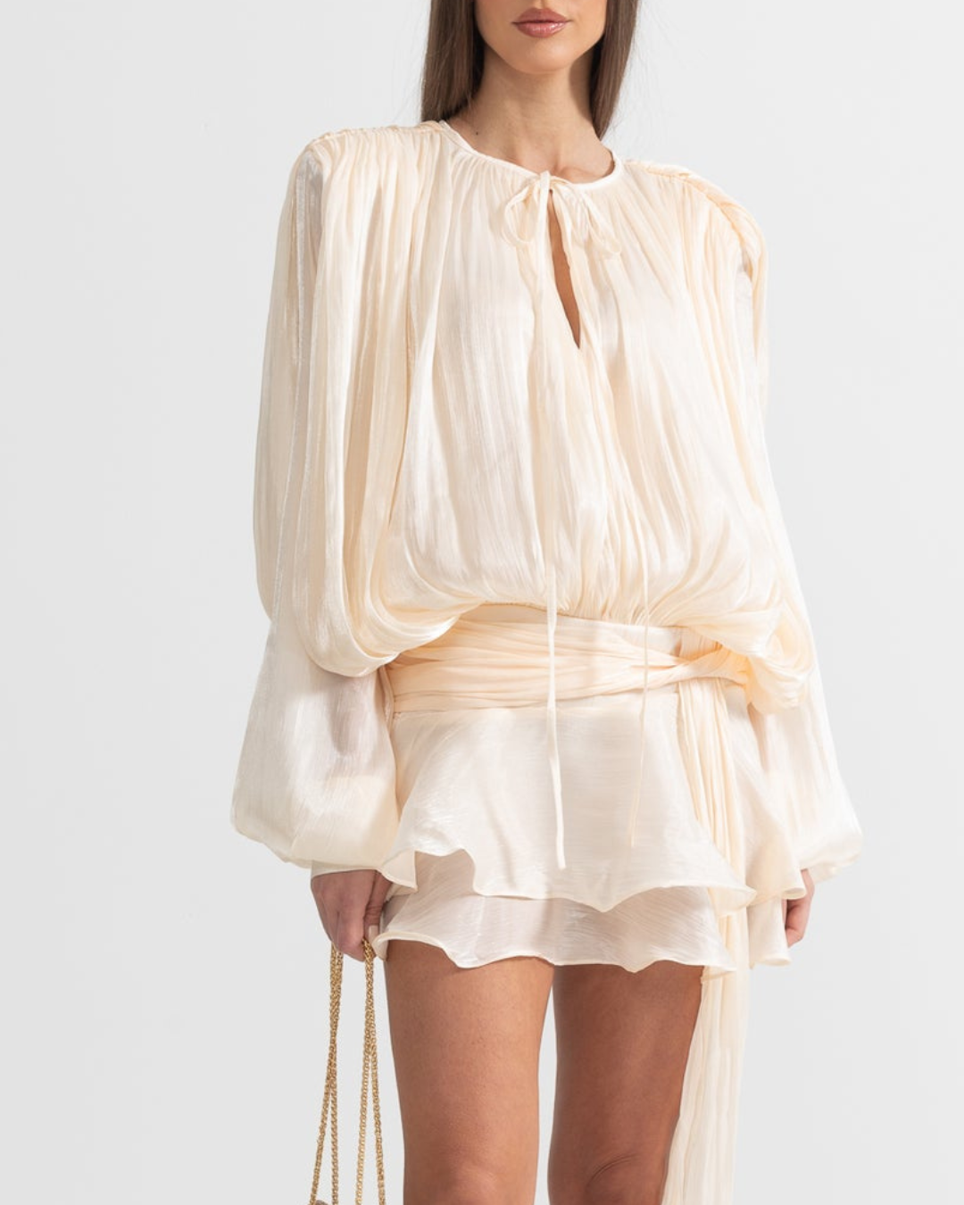 Women cream long sleeve round neck mini dress with cinching belt front view