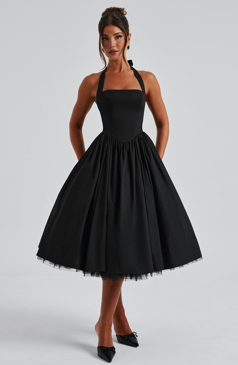 Women black halter neck midi dress with square neckline and gathered skirt, front view