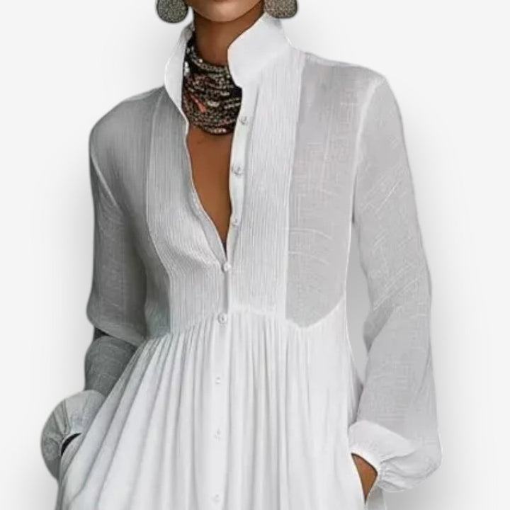 Close-up of women white collared maxi dress showing button-front and high neckline