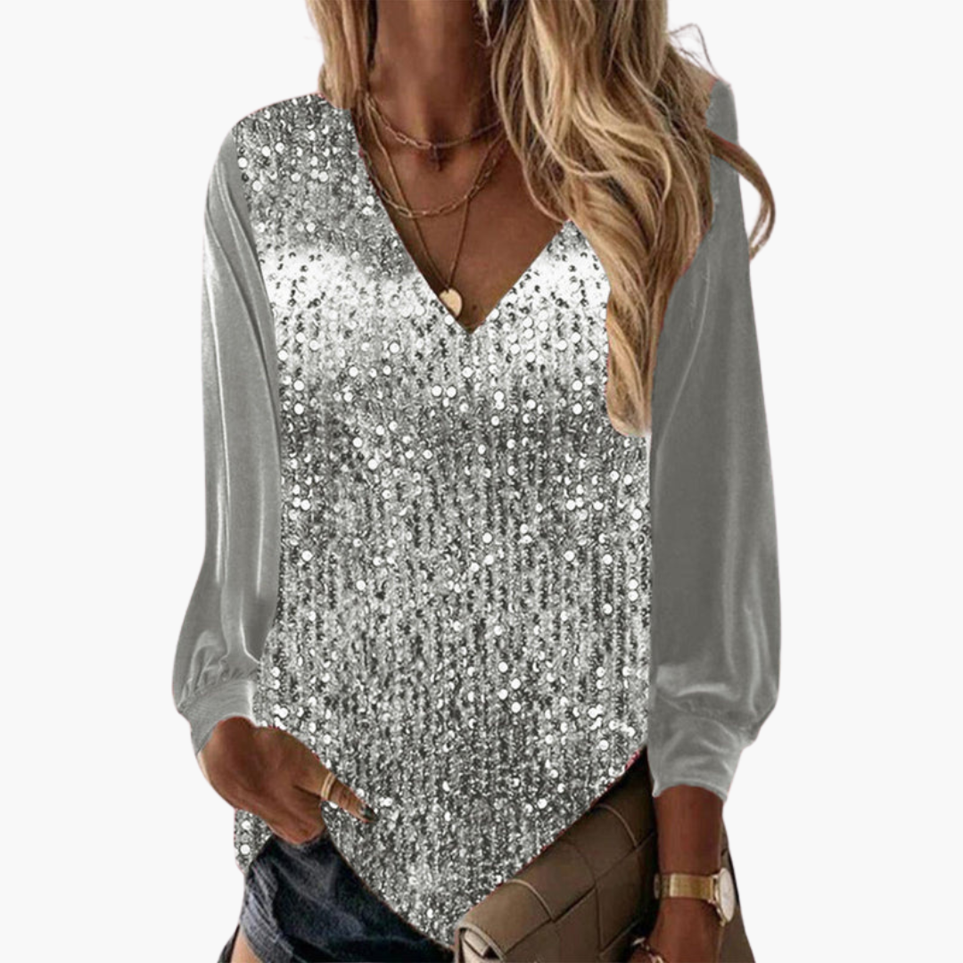 Women silver sequin V-neck long sleeve top with solid sleeves, styled with necklaces
