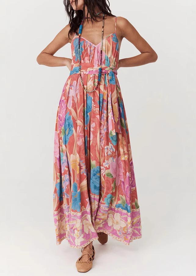 Women's red floral print maxi sundress with V-neckline and full flowing skirt in front view.
