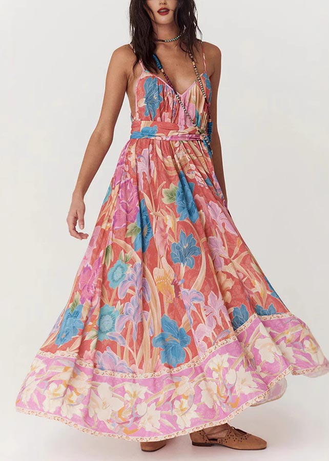 Women's red floral print maxi sundress with V-neckline and decorative belt detail in front view.