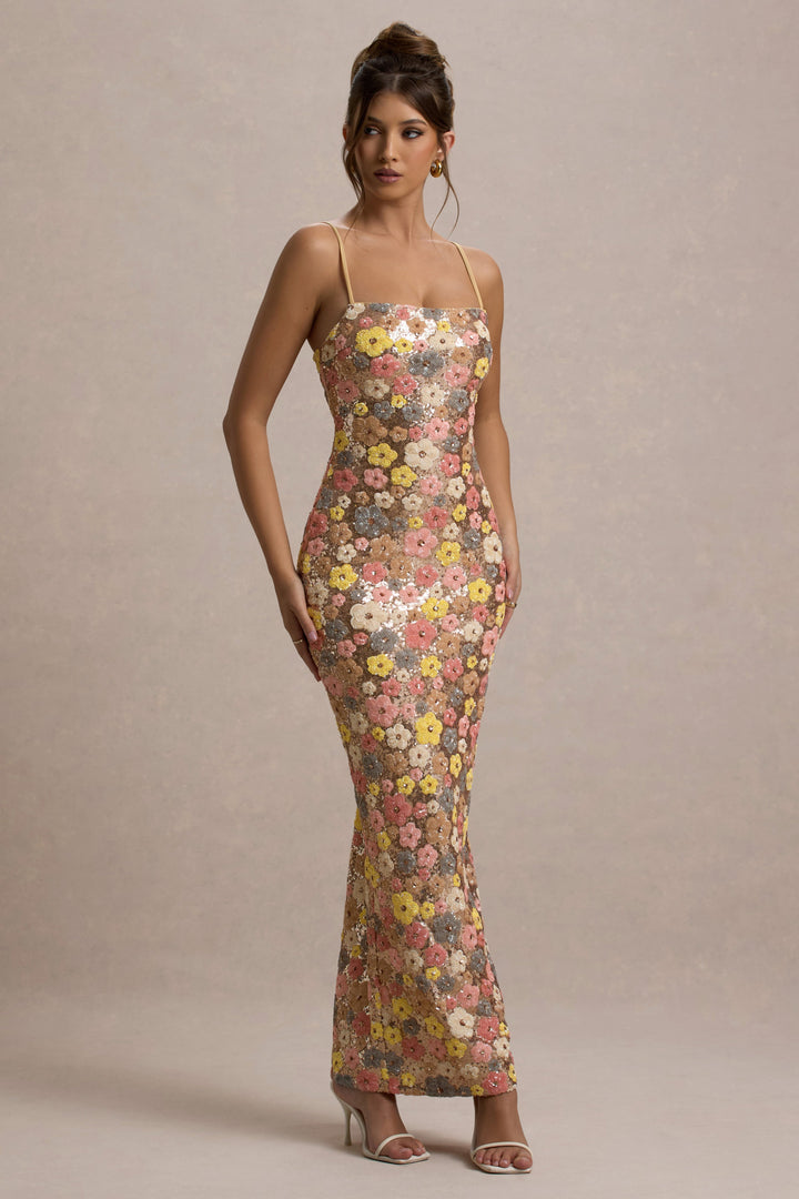 Women multi-color floral sequin maxi dress with adjustable cami straps, standing pose.