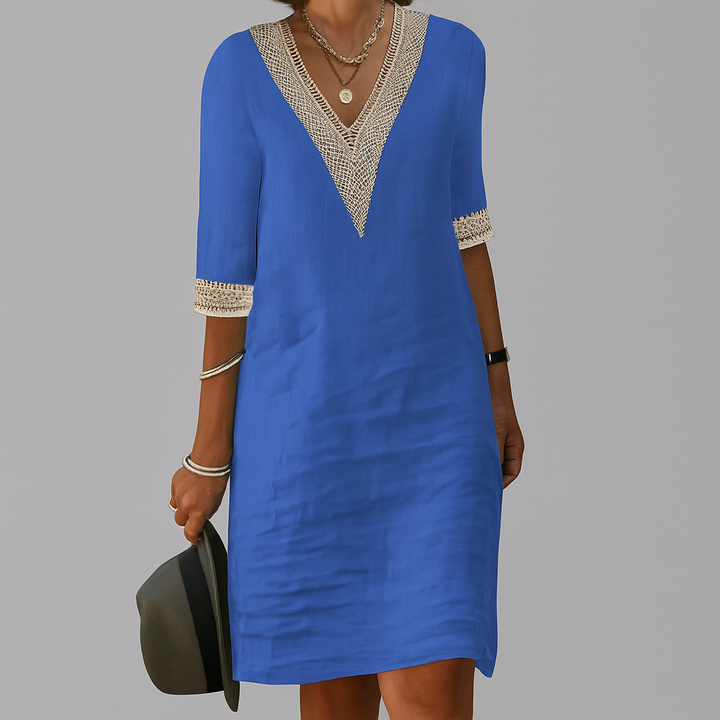 Women blue mini dress with V-neckline and crocheted trim on sleeves, front view