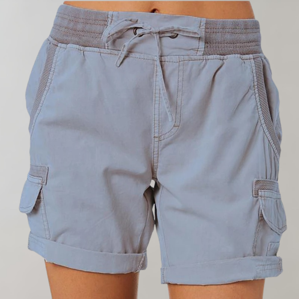 Women light blue high waisted drawstring cargo shorts with cuffed hem and side pockets shown front view