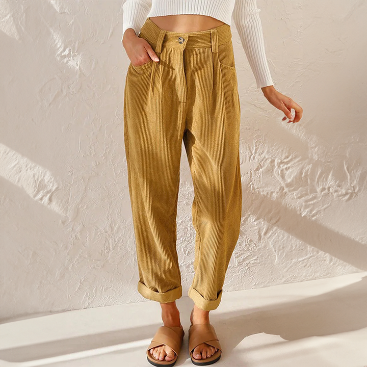 Women mustard ribbed wide leg pants with high waist and front pleats, showing side pocket