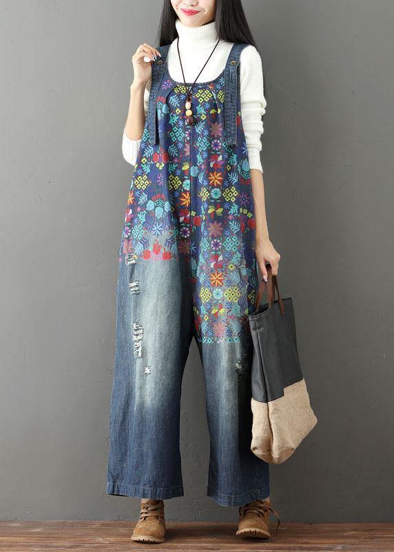 Women blue floral printed wide leg denim jumpsuit, front view with side bag