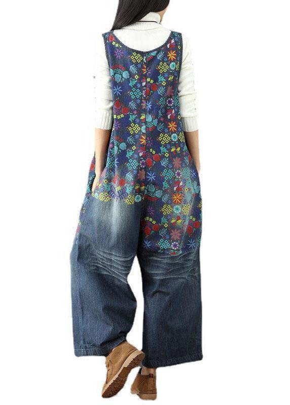 Women blue floral printed wide leg denim jumpsuit with square back, rear view