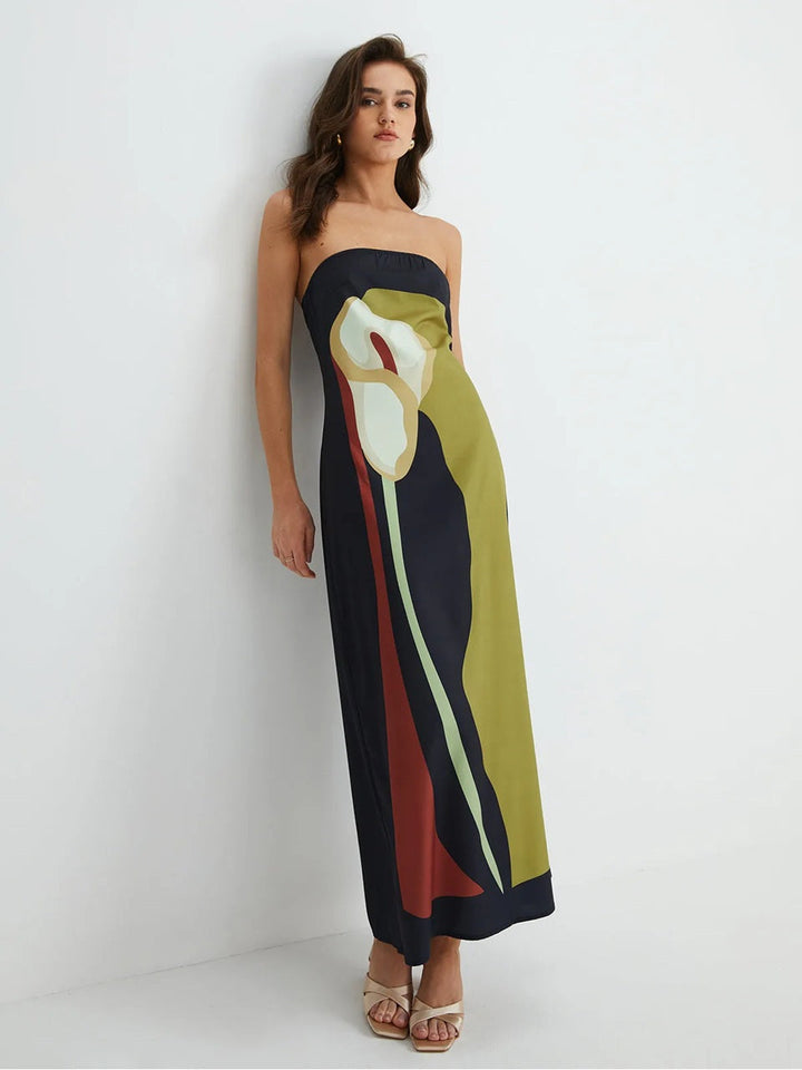Women strapless floral print maxi dress in black and olive green, front view with subtle floral pattern