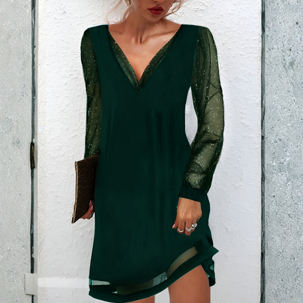 Women green shimmer long sleeve mini dress featuring a deep V-neck and sheer fabric details.
