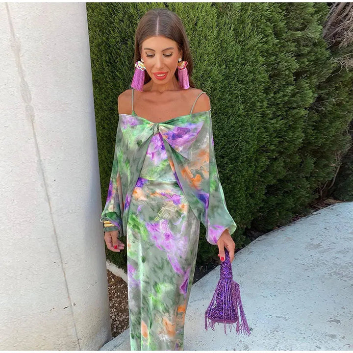 Women multi printed maxi dress with sheer overlay worn as top, front view
