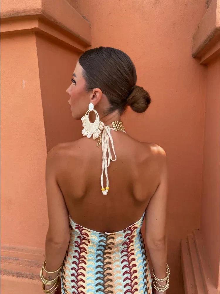Women patterned halter V neck maxi dress back view showing open back and tie detail