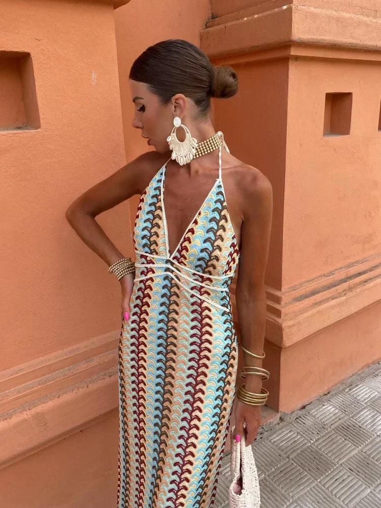 Women patterned halter V neck maxi dress close up showing pattern and neckline detail