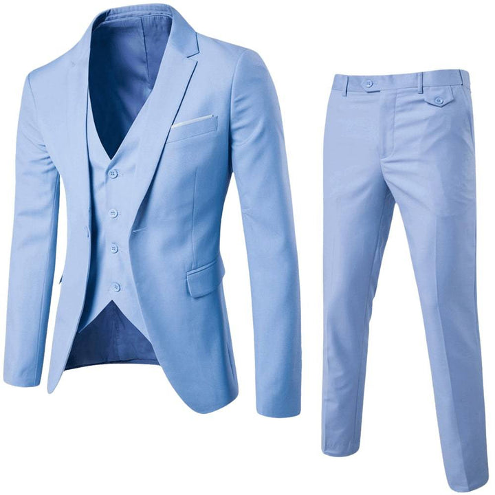 Men light blue three-piece suit set with blazer, vest, and trousers in studio shot