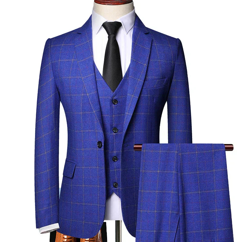 Men's blue windowpane plaid three-piece suit set with visible blazer, vest, and trousers