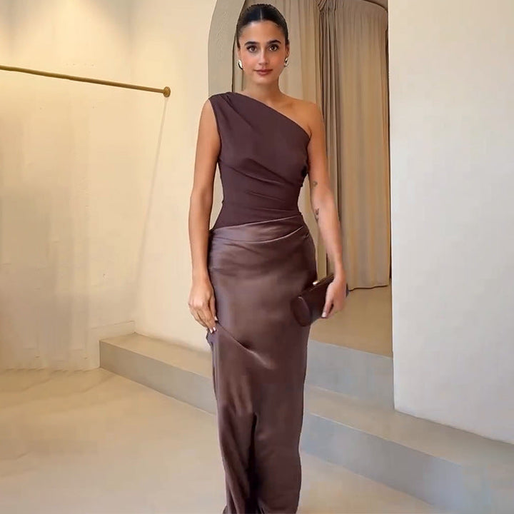 Women brown one shoulder maxi dress with draped waist detail shown from the front angle.