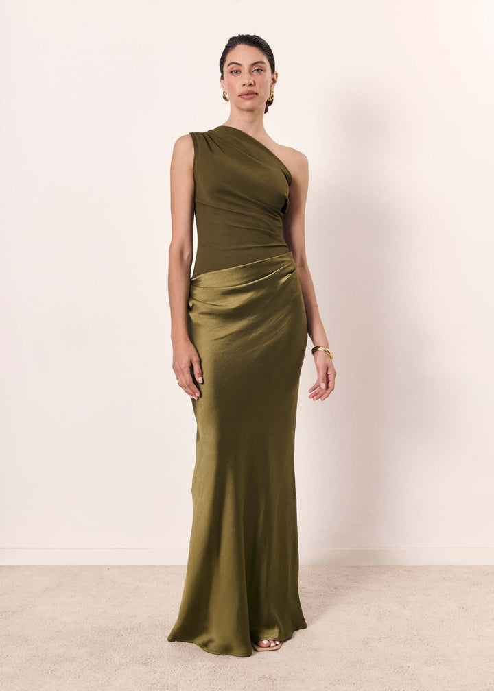 Women olive green one shoulder maxi dress with draped waist from the back, showing open shoulder.