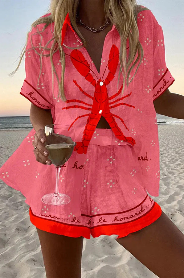 Women pink summer printed short sleeve shorts set with red lobster graphic on beach