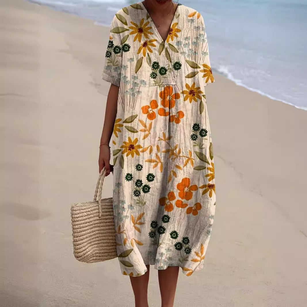 Women orange floral printed midi dress with V-neck and short sleeves, front view