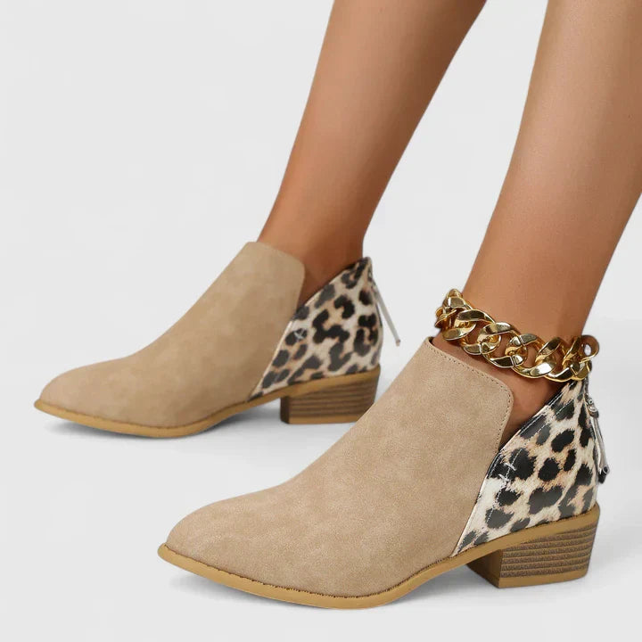 Women beige leopard print block heel ankle boots showing pointed toe and block heel