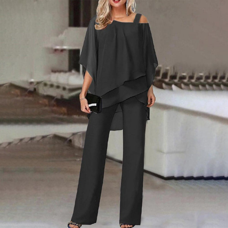 Women black sleeveless off shoulder layered pant set, draped top detail
