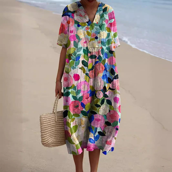 Women colorful floral printed midi dress with V-neck and short sleeves, front view