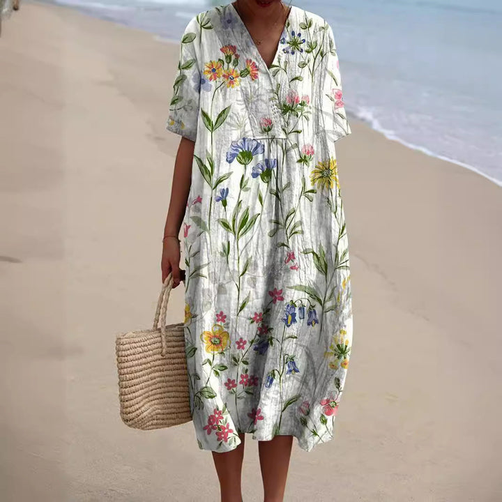 Women white floral printed midi dress with V-neck and short sleeves, front view