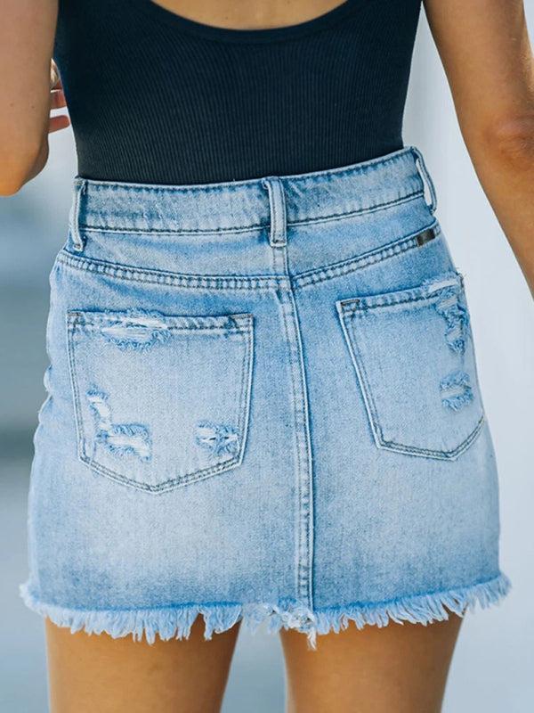 Women light blue distressed denim mini skirt back view with patch pockets and frayed hem