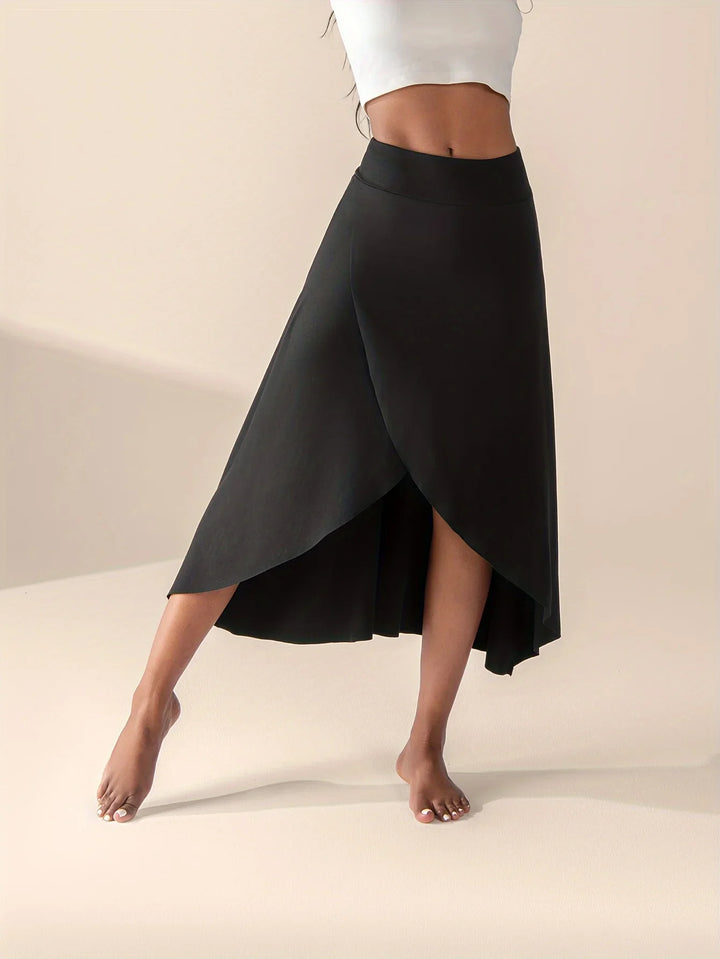 Women black high waisted wrap midi skirt with legs revealed from wrap opening