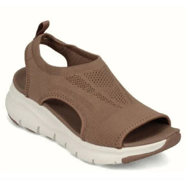 Single taupe mesh slip on sandal with white sporty sole, side view