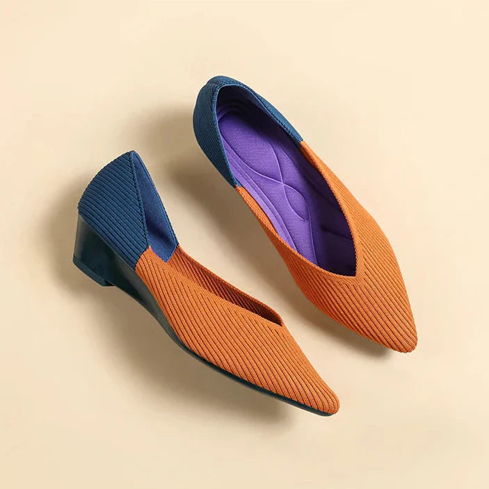 Women orange and blue colorblock pointed toe wedge pumps view from above