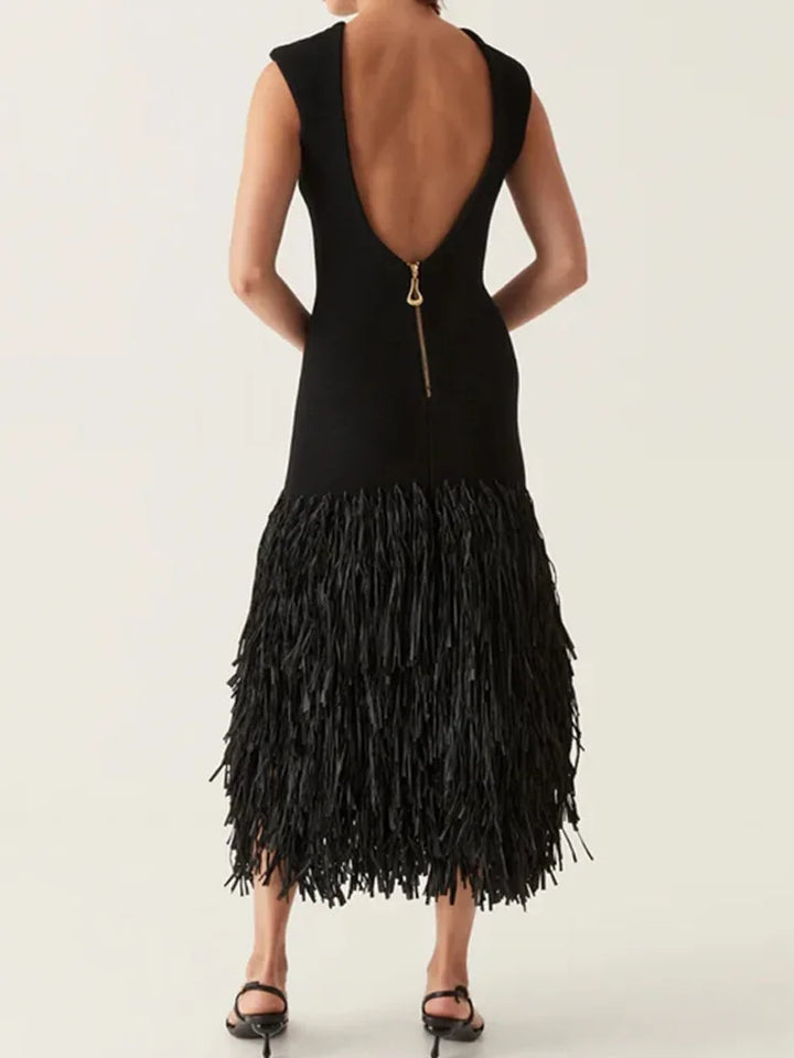 Women black sleeveless feathered midi dress, back view showing deep V and gold zipper